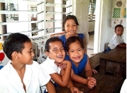 Girl with Down Syndrome and friends at regular primary school